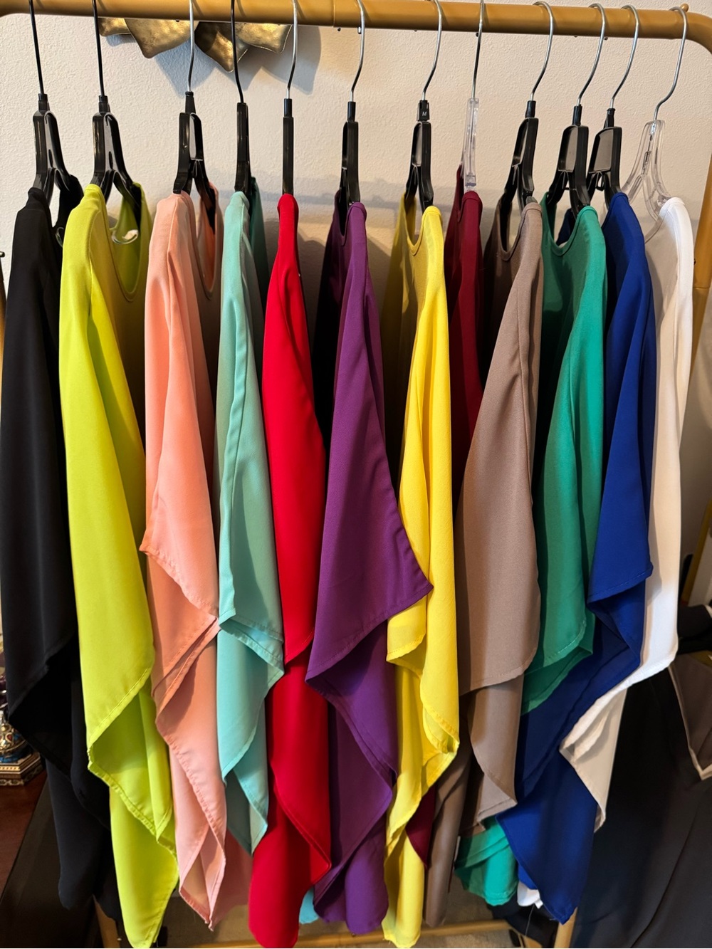 Set: 12 flowing poncho style blouses in a variety of vibrant and neutral colors